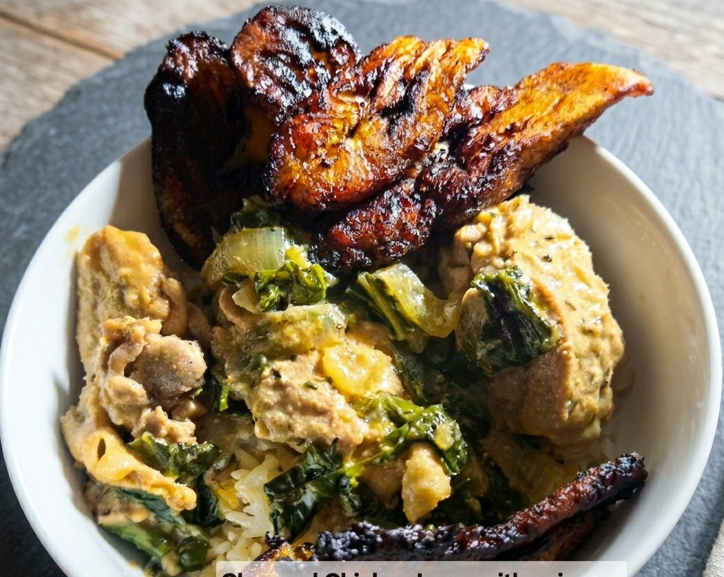 Bowl of chopped chicken legs simmered in coconut milk with bok choy over jasmine rice, topped with fried sweet plantains