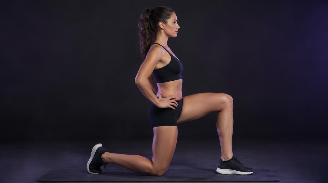 Woman half-kneeling with the back knee down and hips pressed gently forward